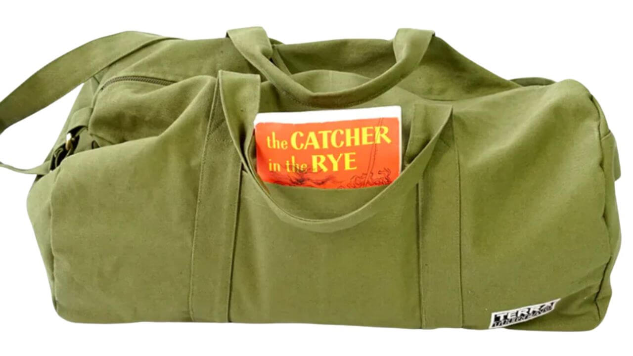 eco friendly green duffle bag with book poking out of pocket