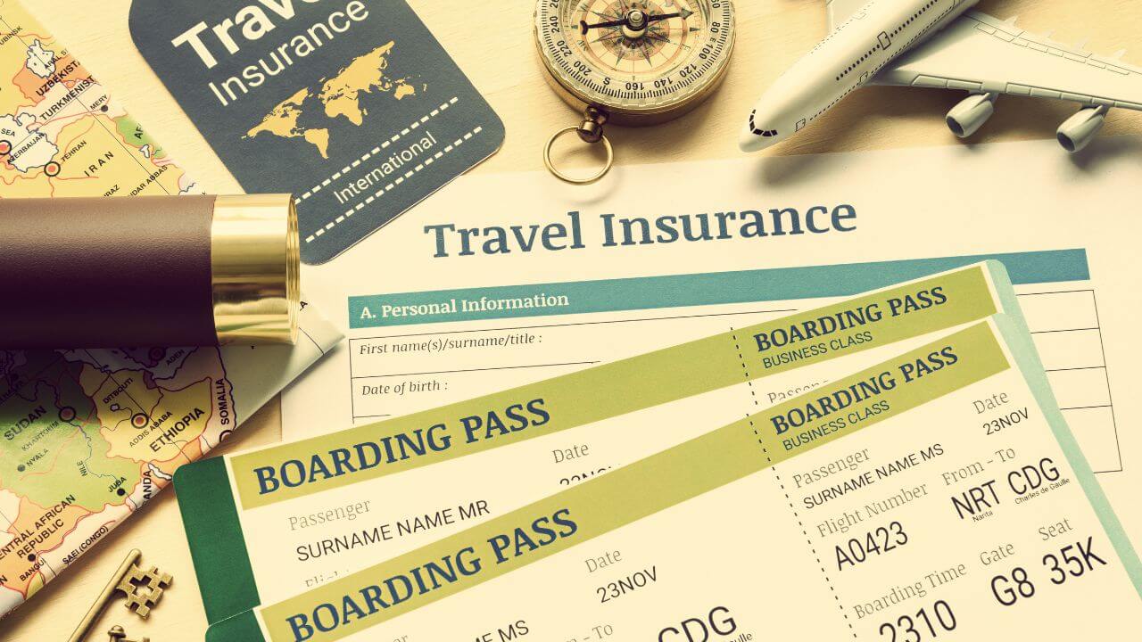 travel insurance papers and boarding passes