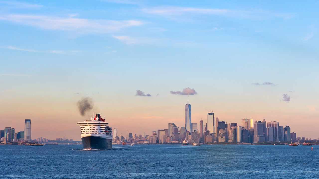 cruise ship leaving nyc at sunset