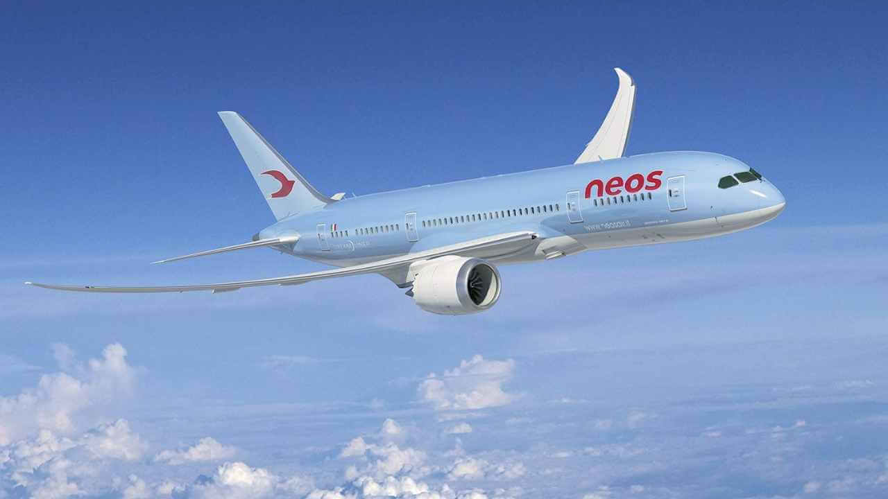 neos airline flying in the sky