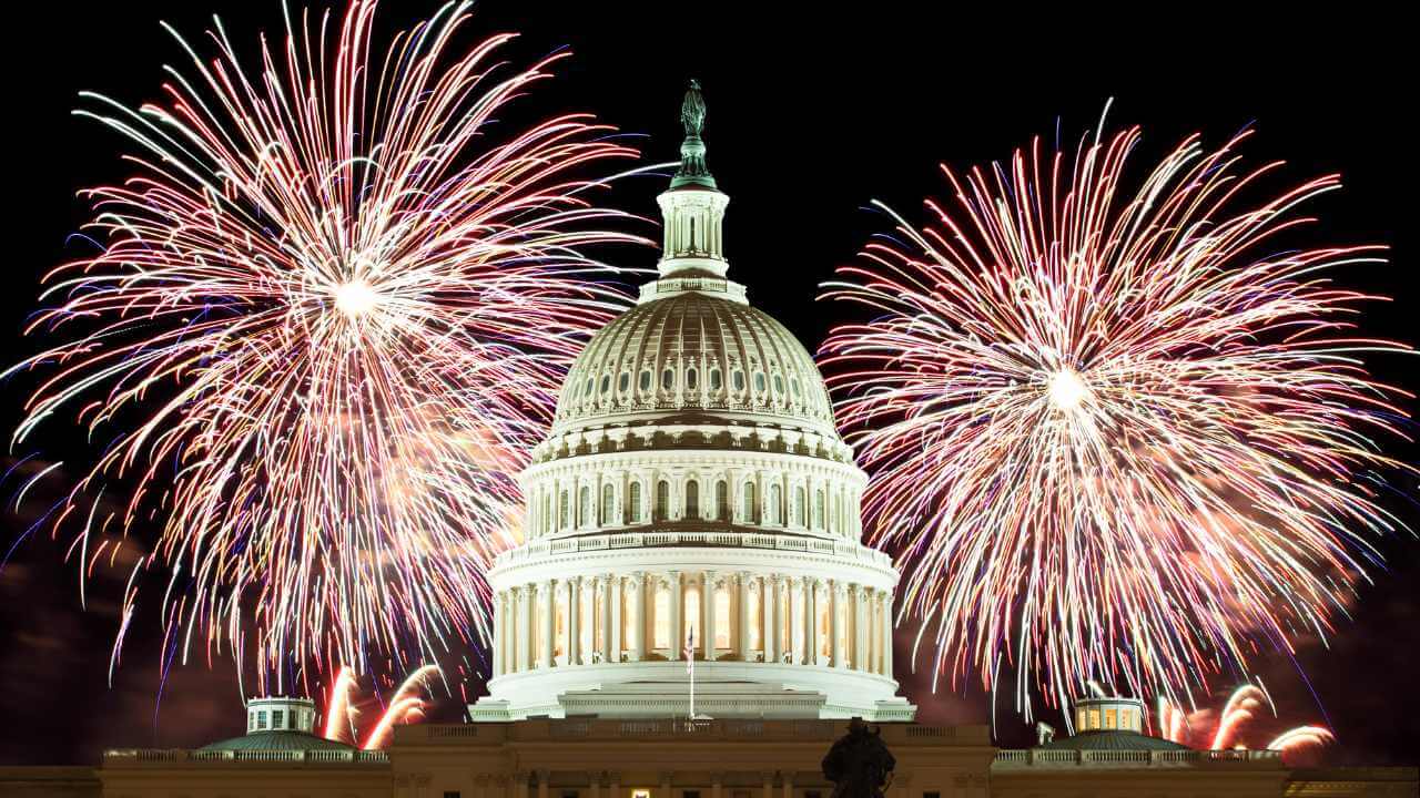 fireworks behind the capital building during the fourth of july 