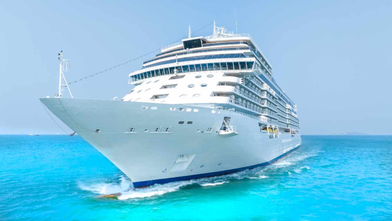 front view of a cruise ship in crystal clear blue water