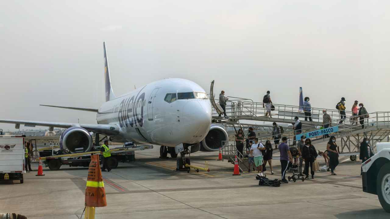 airline boarding on tarmac for avelo