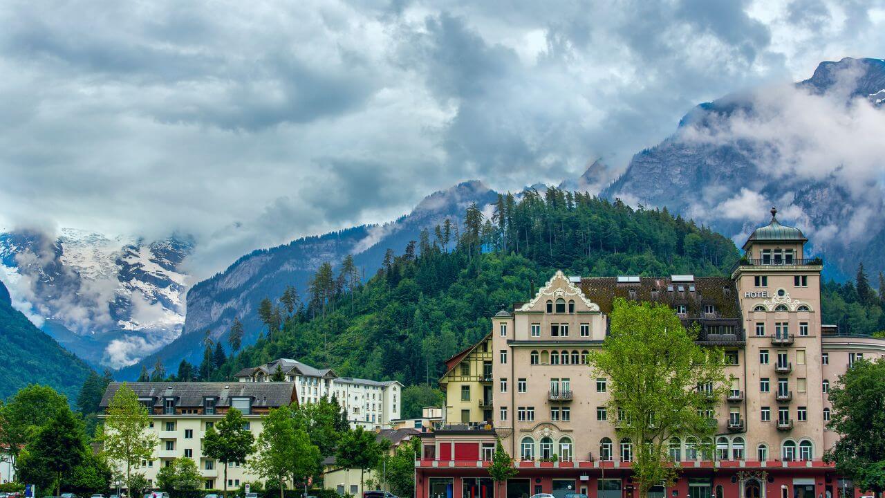 view of the mountains in interlaken during the summer time