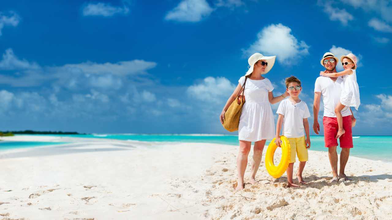 family on a tropical beach vacation 