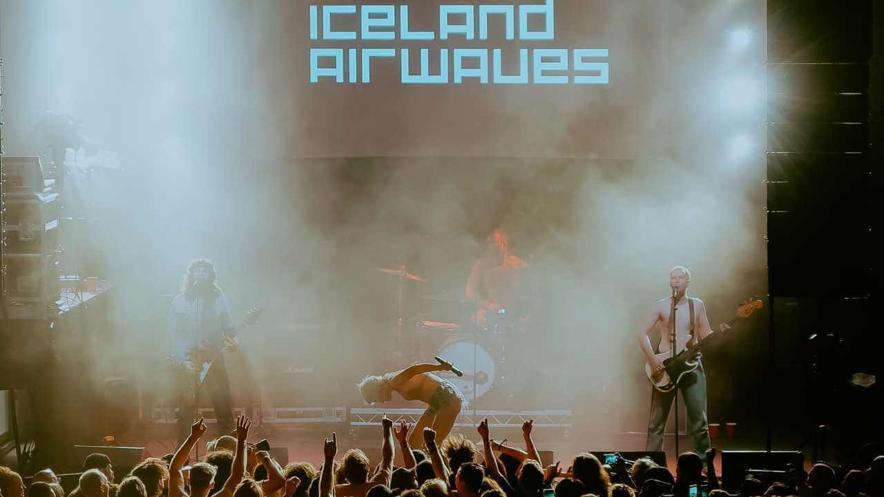 iceland airwaves music festival with a singer on stage