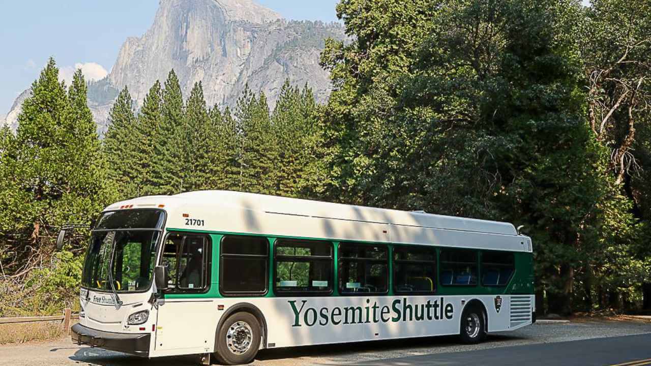 yosemite national park shuttle with mountains in background