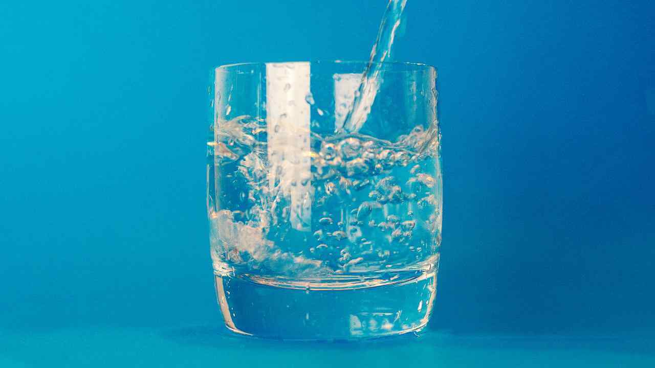 drinking water in glass