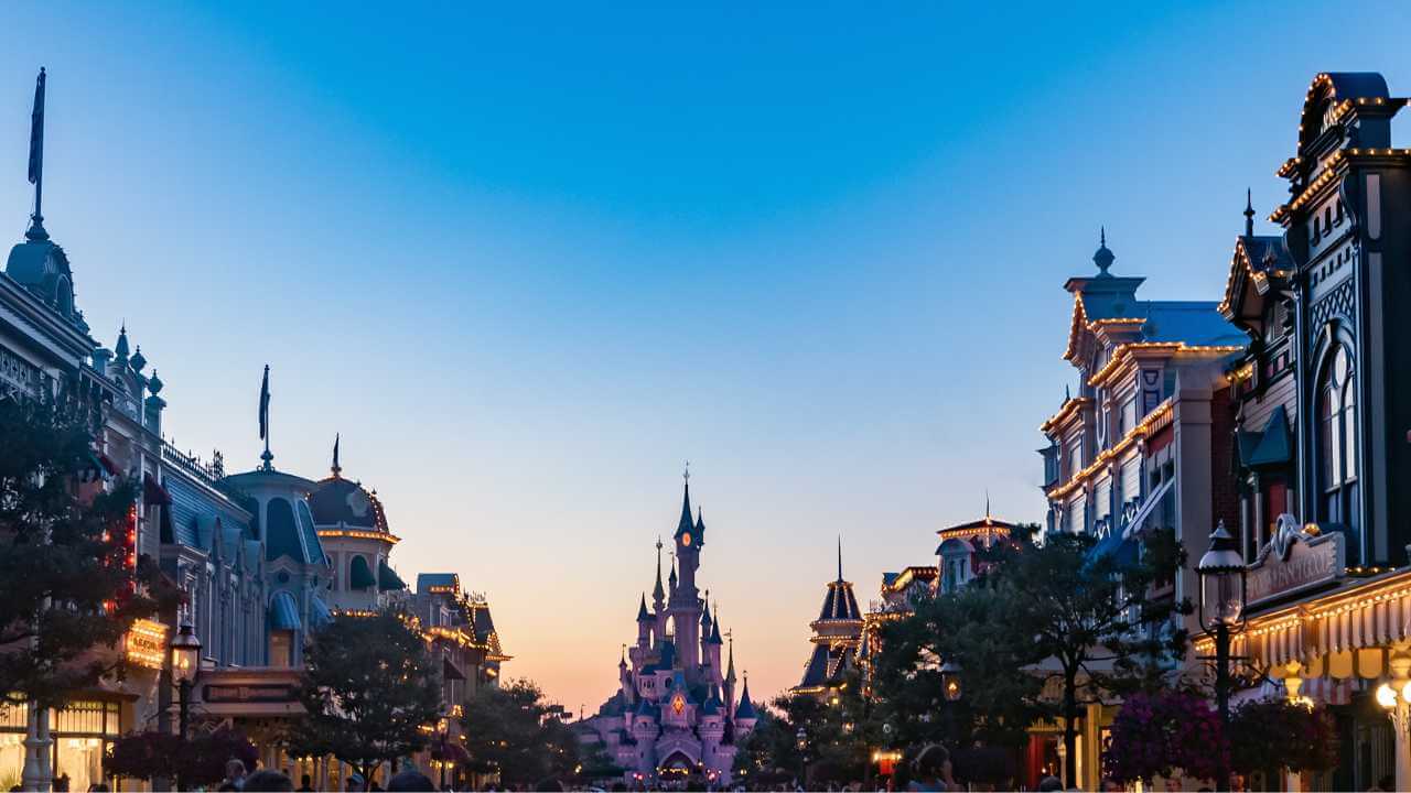 view of cinderella's castle at sunset from main street