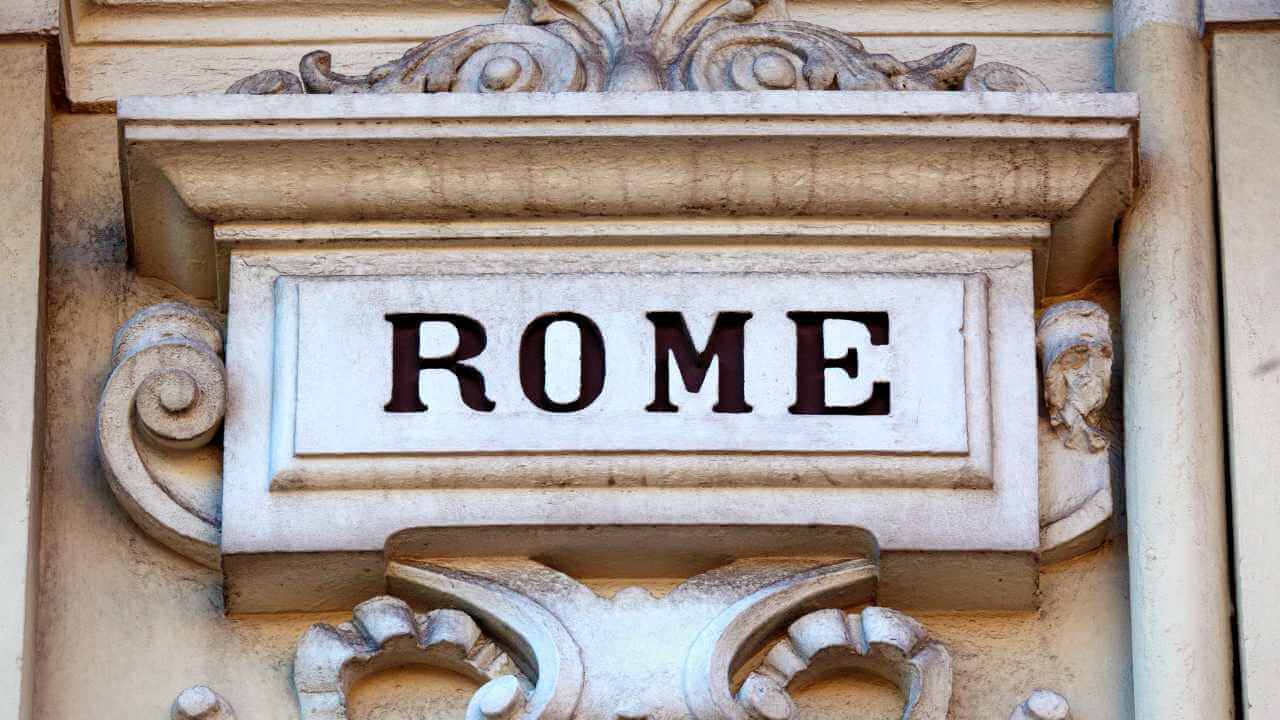rome sign in ancient building 