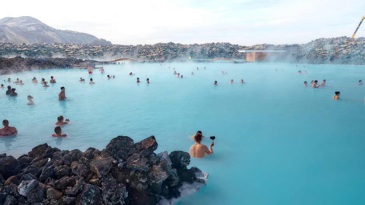 multiple tourist in the blue lagoon in iceland