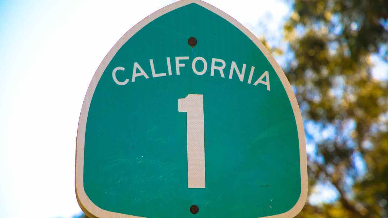 a california highway sign with the number one on it
