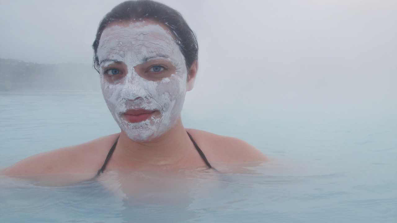 woman wearing a face mask in the blue lagoon