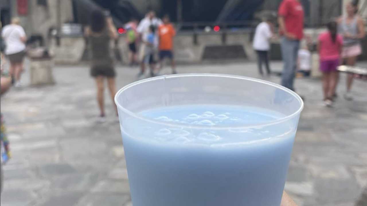 blue milk in a cup in front of star wars land