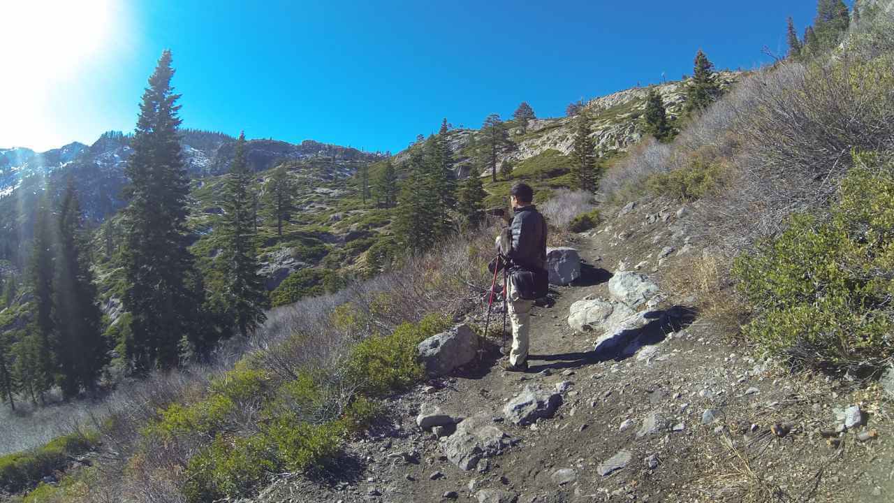 man hiking in lake tahoe