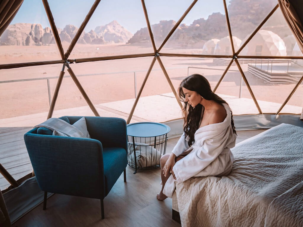 Elona Karafin sitting in a geodesic dome hotel in Jordan