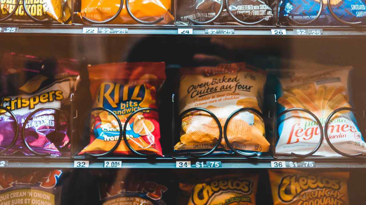 a vending machine filled with chips and other snacks