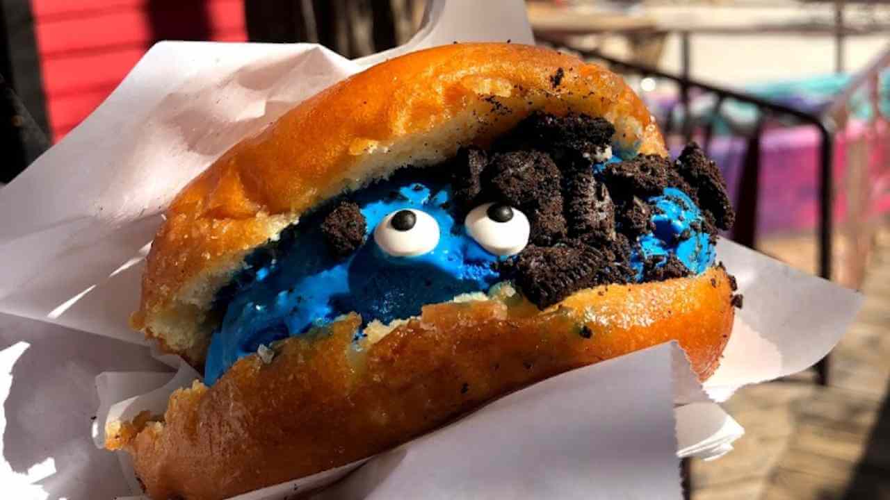 a close up of a sandwich with googly eyes on it