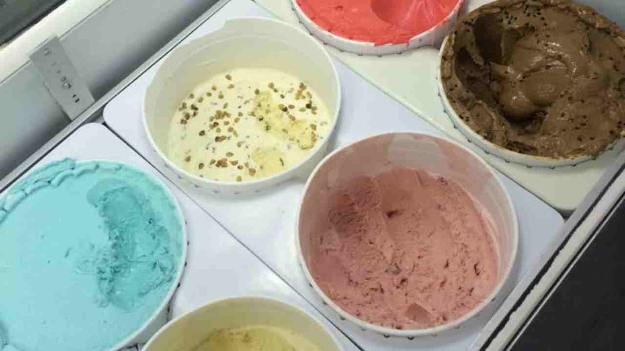 several different flavors of ice cream in bowls