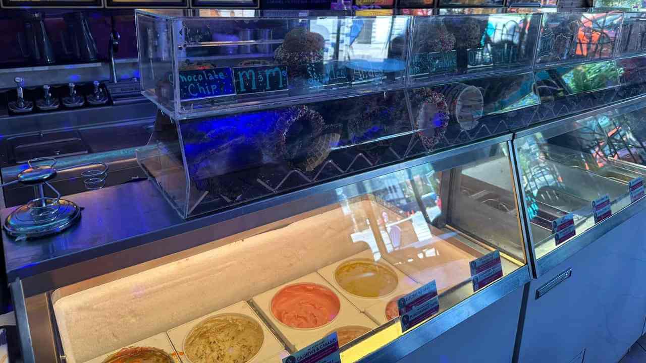 an ice cream shop with many different types of ice cream