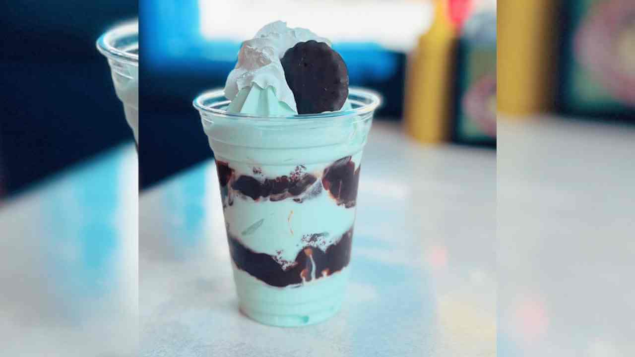 an ice cream sundae in a cup on a table