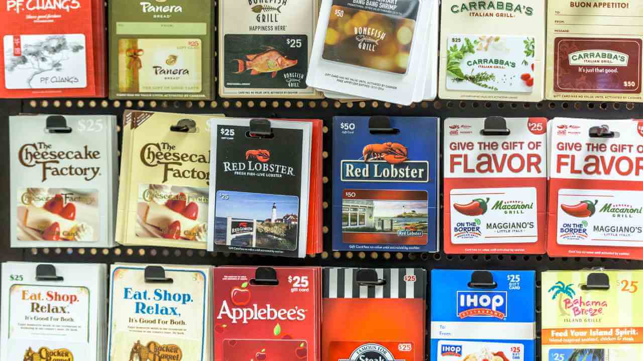 many different types of cigarettes are displayed on a shelf