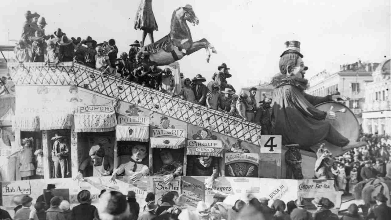 An old black and white photo of a parade float