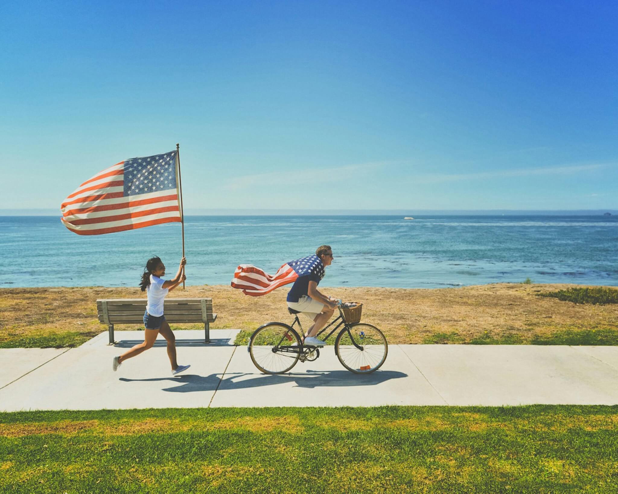 man and woman with american flag