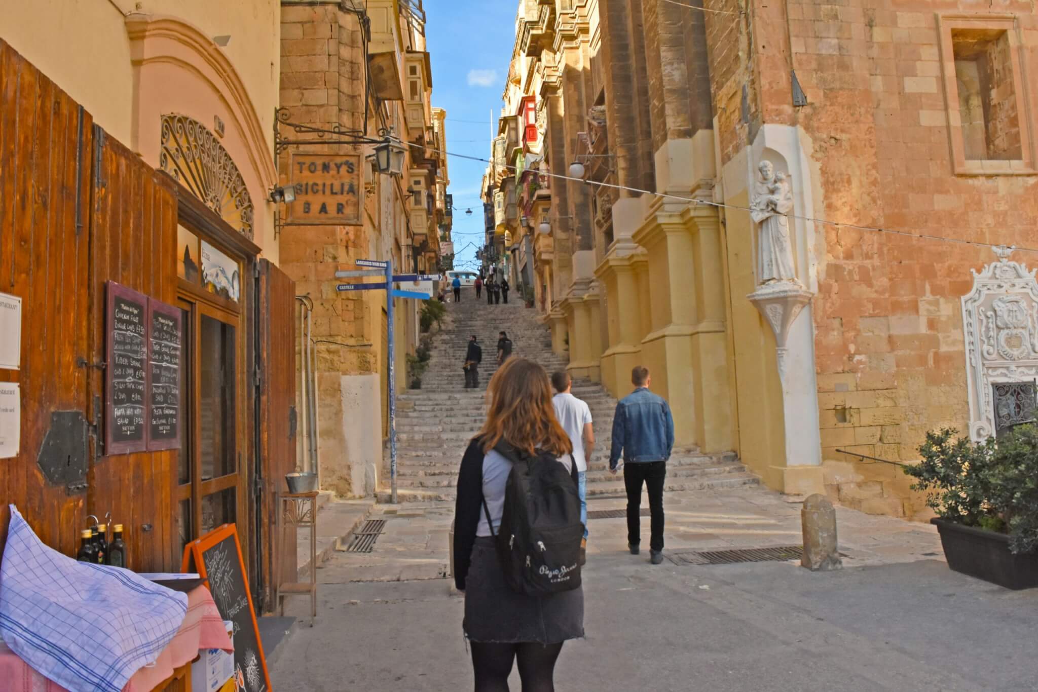 woman walking through a city