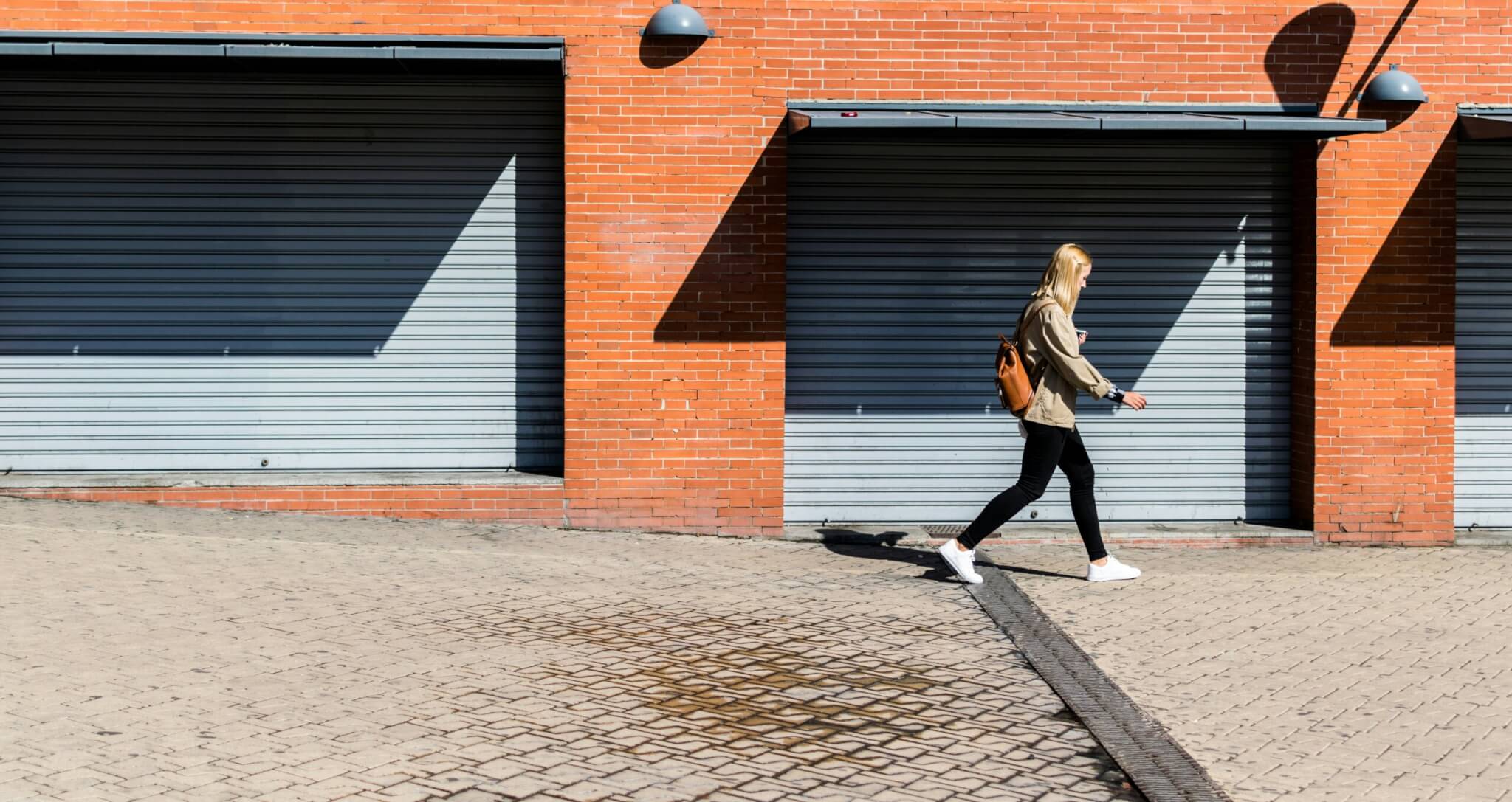 woman walking on street