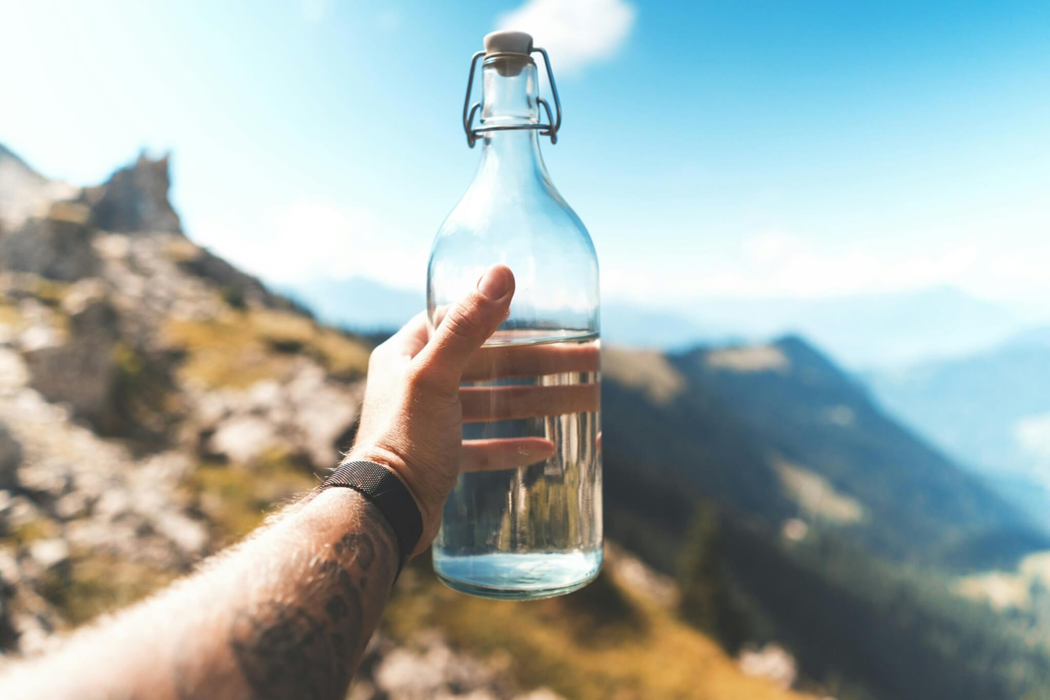 man holding a water bottle