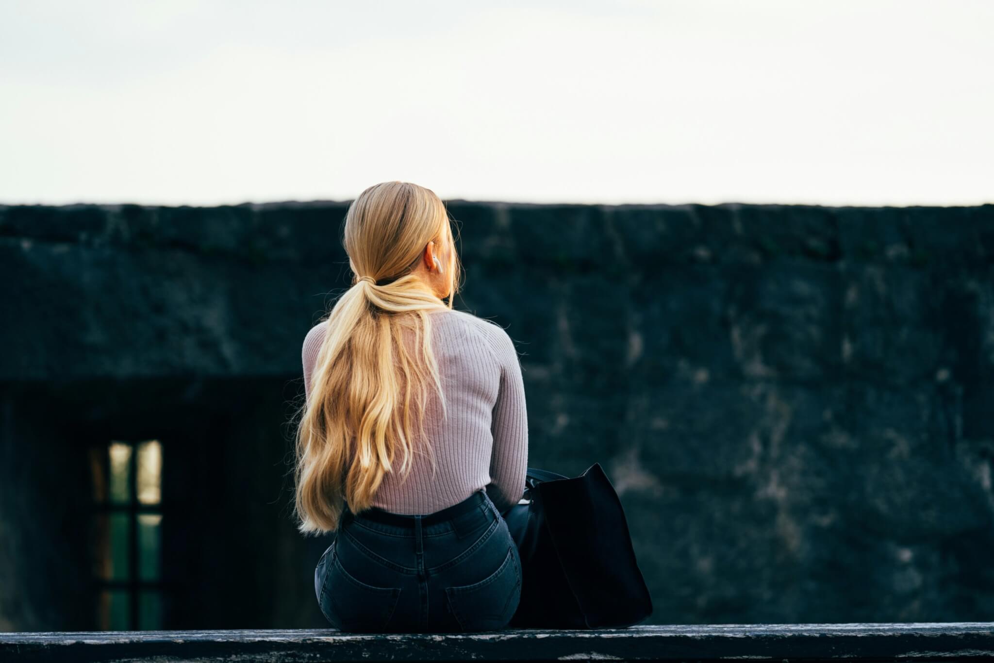 woman sitting on a bench