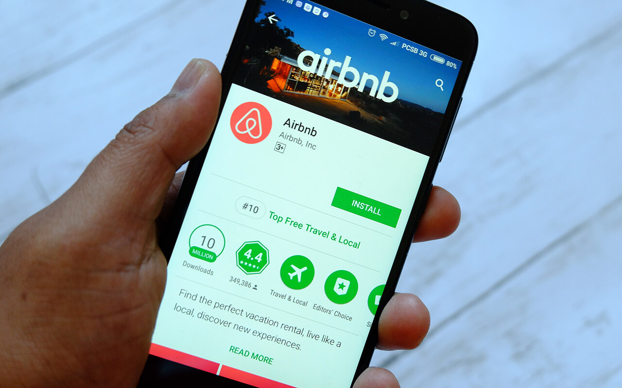 Person using Airbnb app