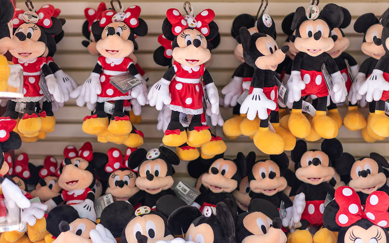 Mickey and Minnie Mouse dolls for sale at a Disney park