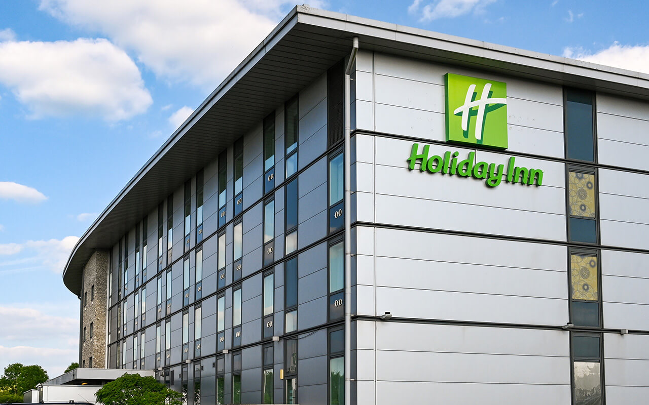 Andover, England - June 2021: Exterior of the Holiday Inn hotel at a service station near Stonehenge