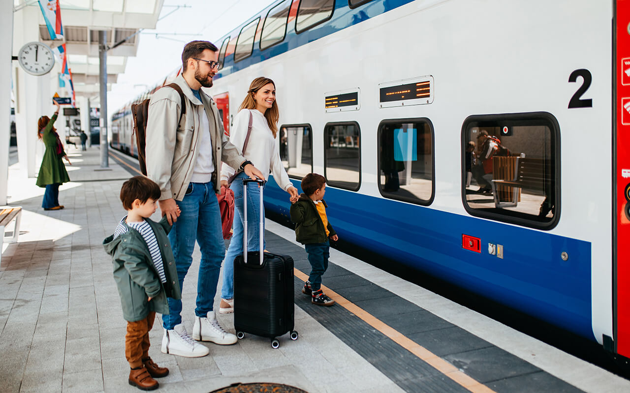 Family boarding a train