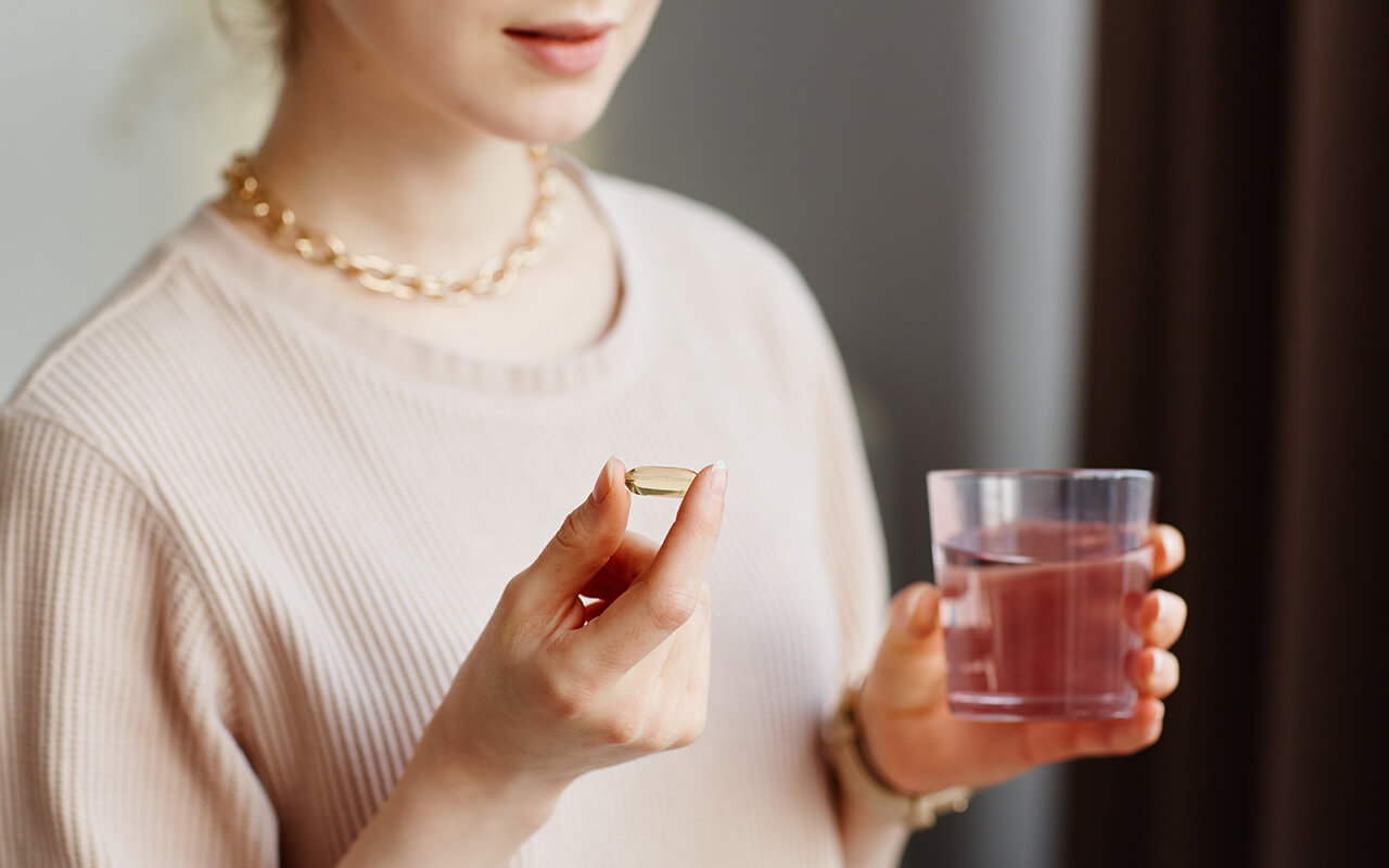 Woman taking supplements 