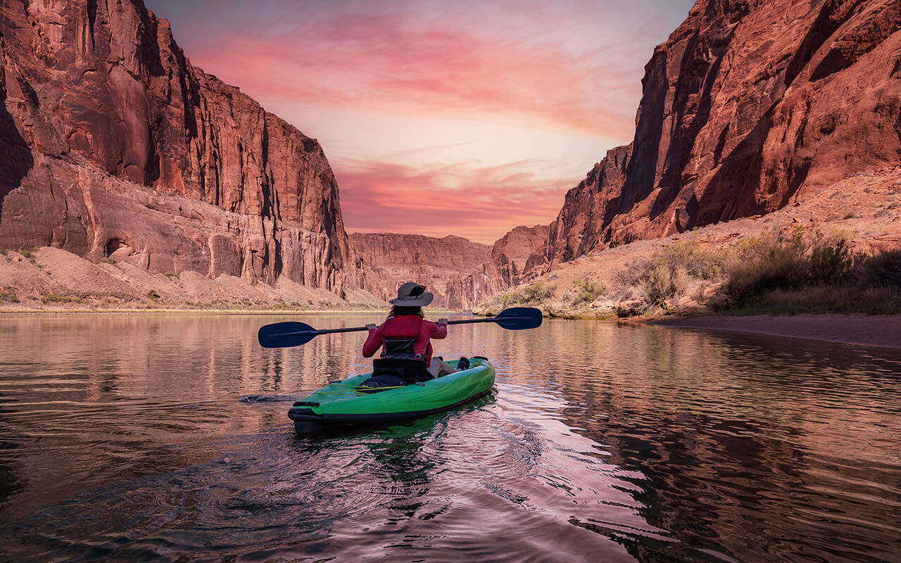 Woman kayaking in a river