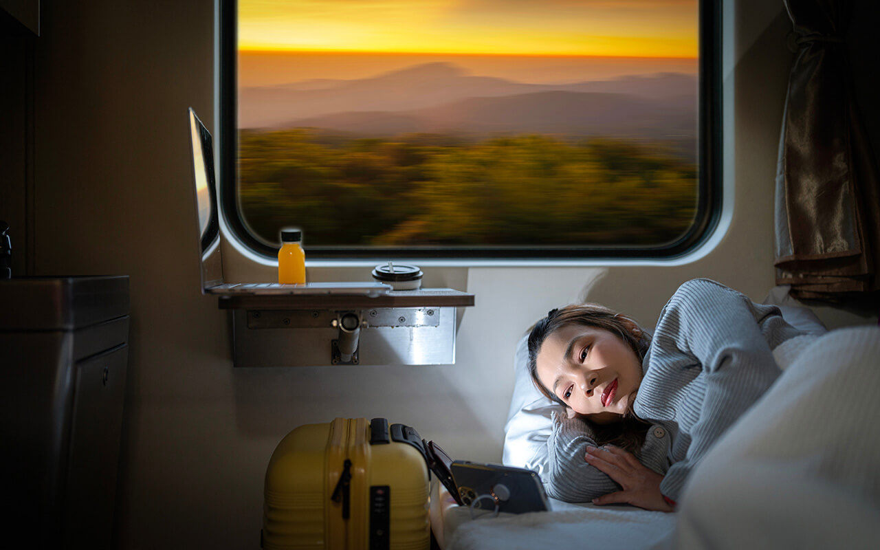 Woman sleeping on a train