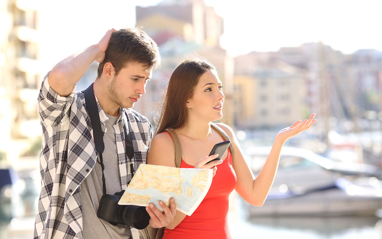 Couple lost and looking at a map