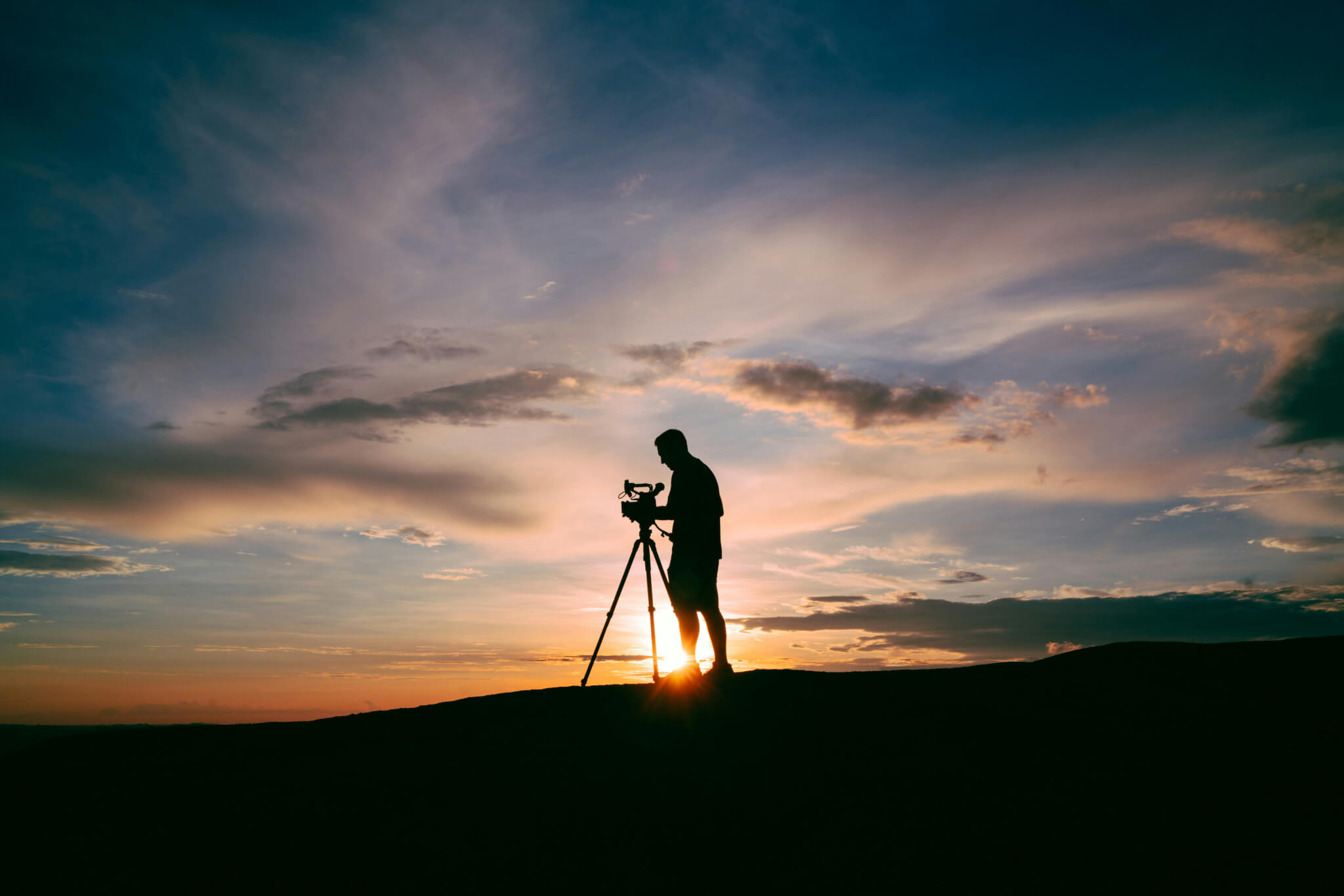 man recording a video