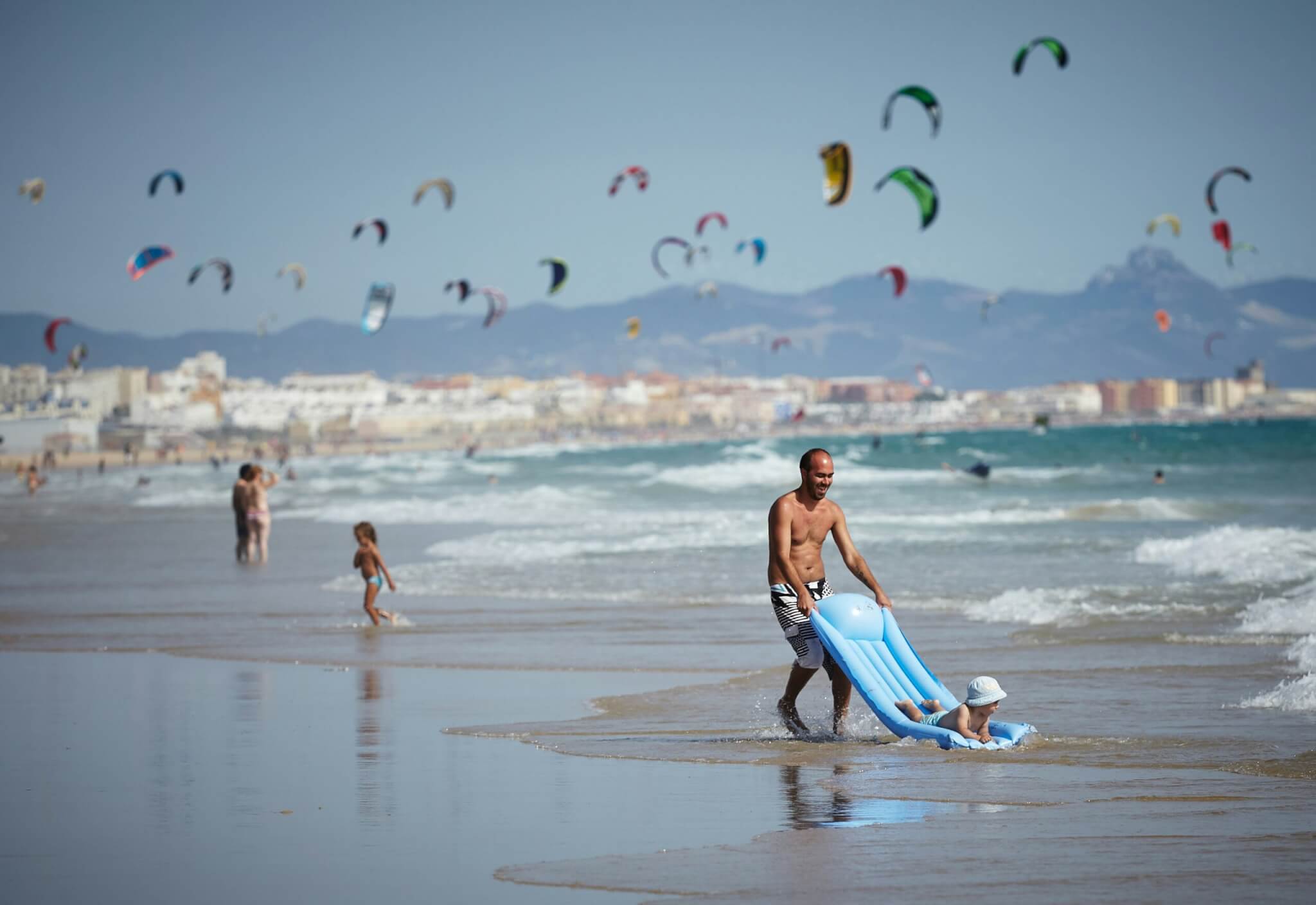 father and son on beach