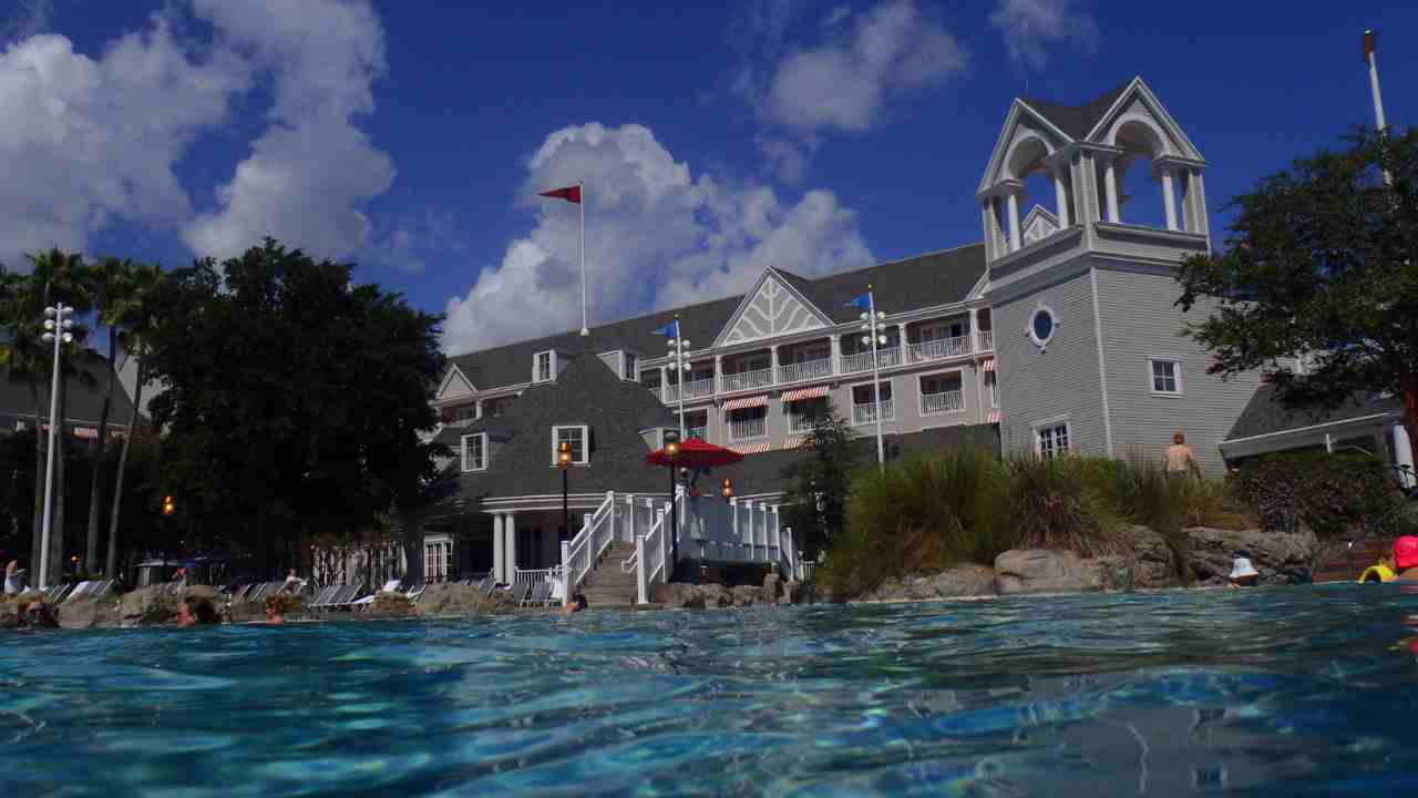 view of disney's beach club resort from inside the pool