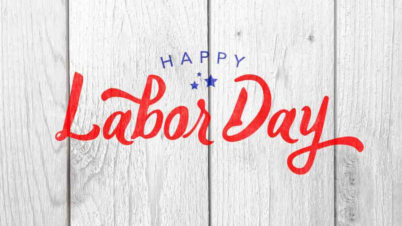 happy labor day text on white wooden background