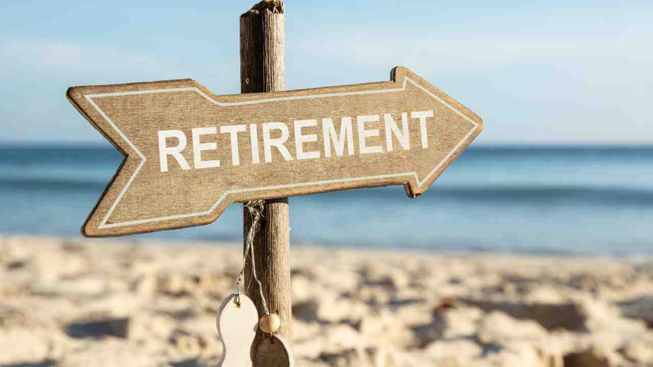 retirement sign on the beach