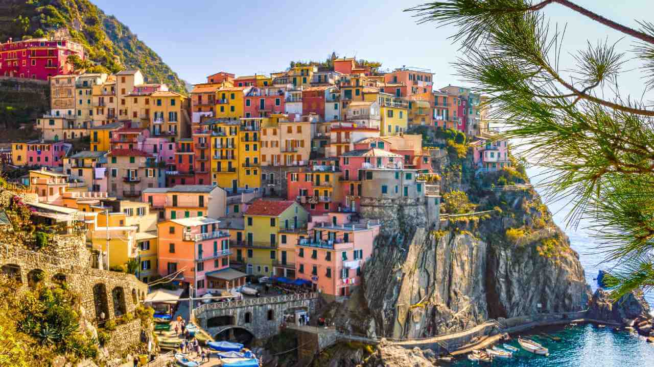 colorful houses on the cliffs of Manarola, Cinque Terre, Italy