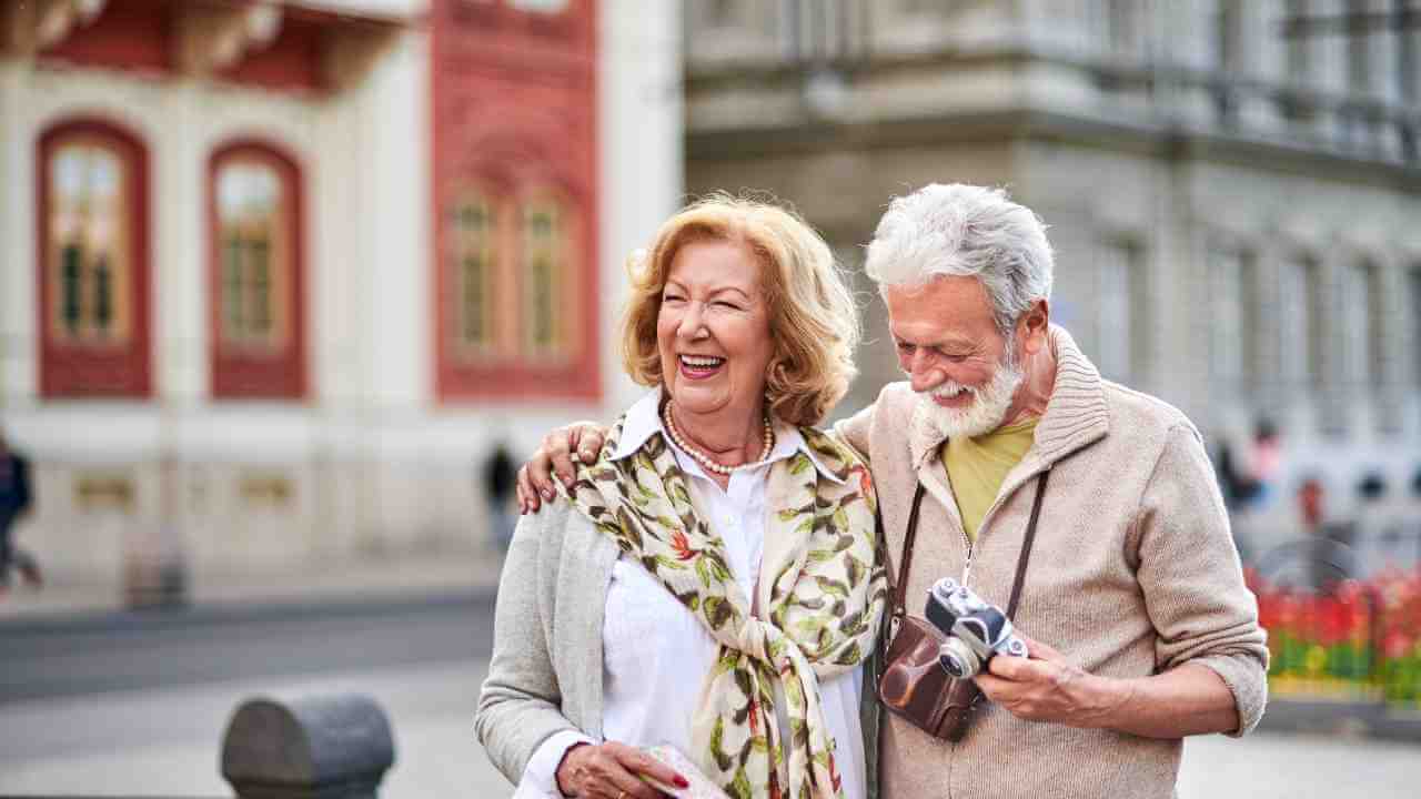 A couple is taking a photo together