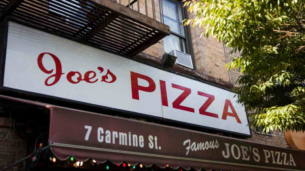 pizza place sign in nyc