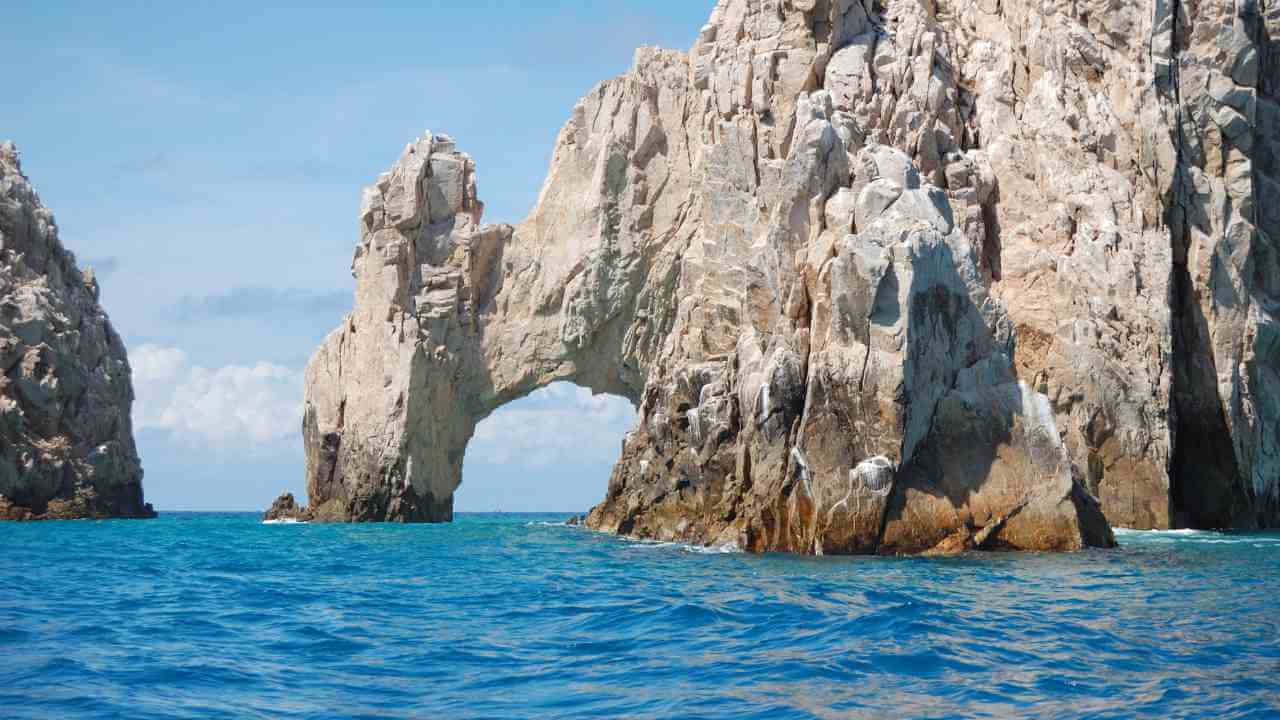 rock formations in the ocean near cabo san lucas, mexico