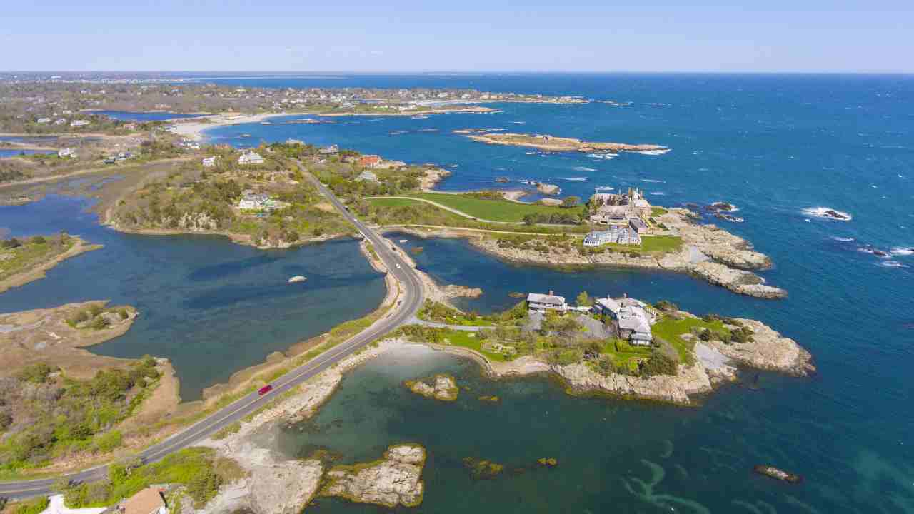 an aerial view of an island with houses on it